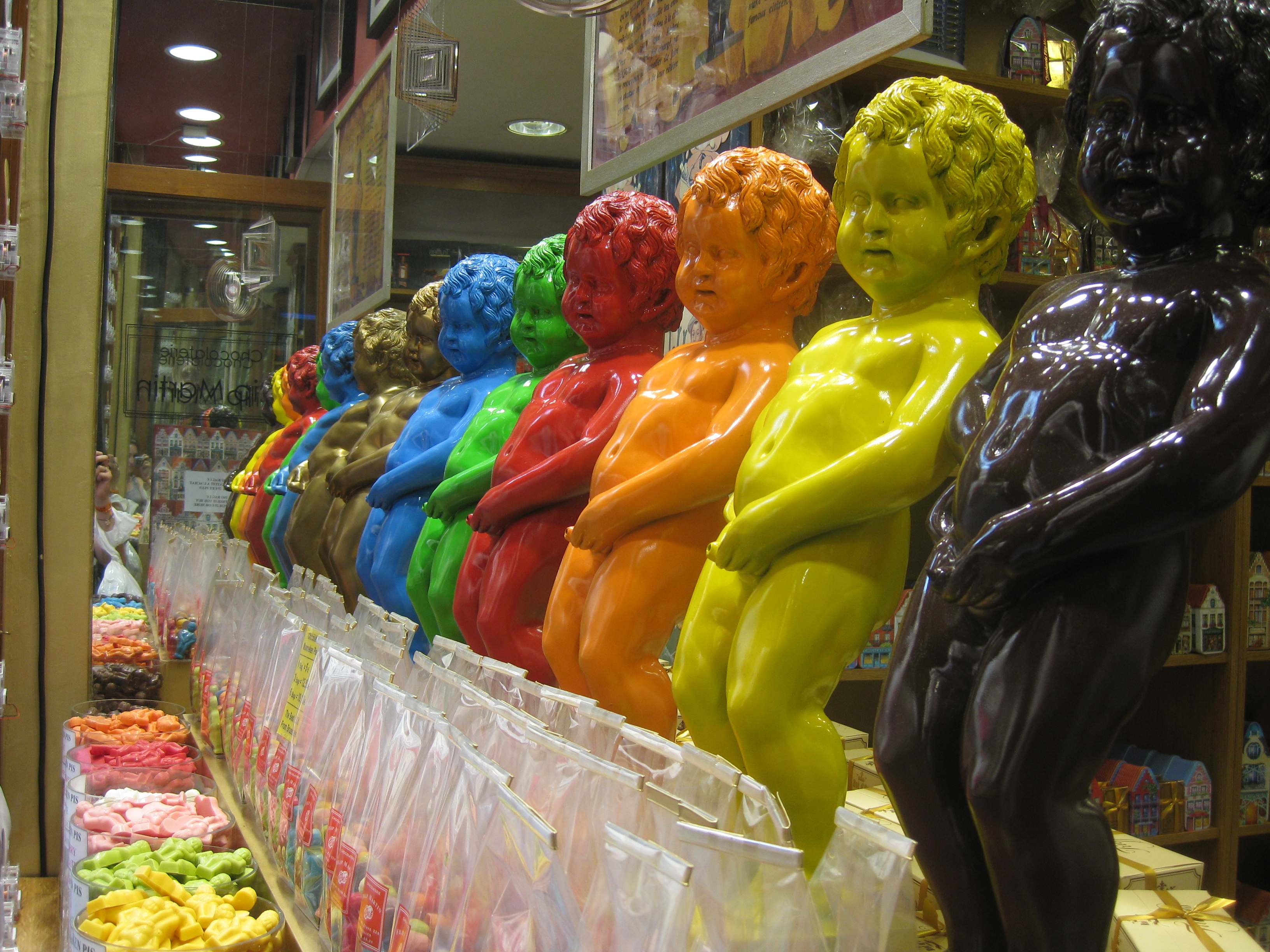 He's everywhere!  Sculptures of the Manneken Pis in a chocolate shop.