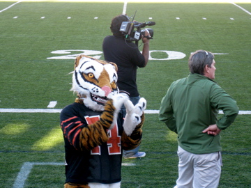 the Princeton mascot cheers during the first home football game